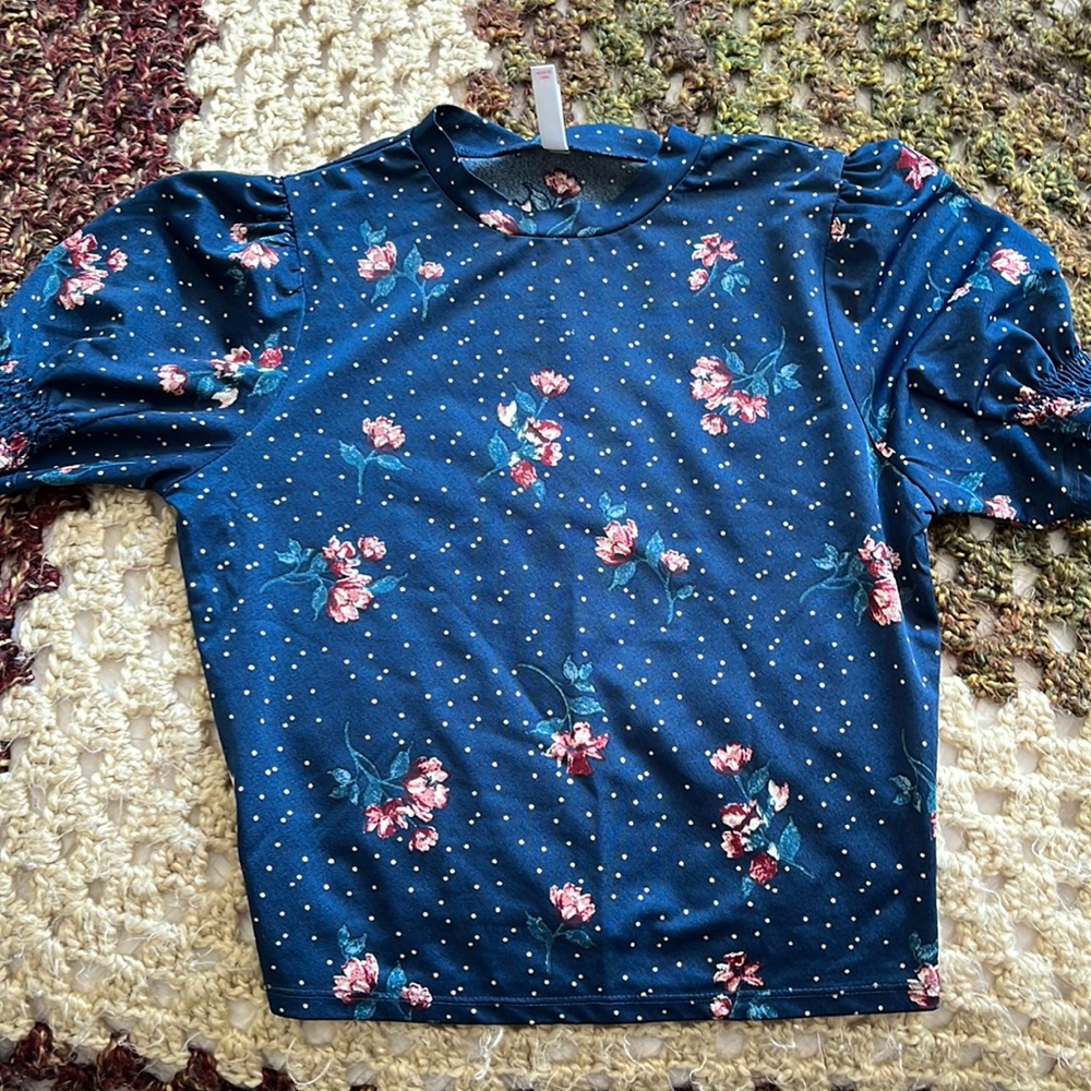 Blue top with pink flowers